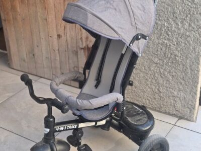 Tricycle pour Bébé Besney. Equipé d'une ceinture de sécurité et d'une boite de rangement à l'arrière du tricycle . Prix indiqué est pour 1/2 journée (5€ pour 1/2 journée)